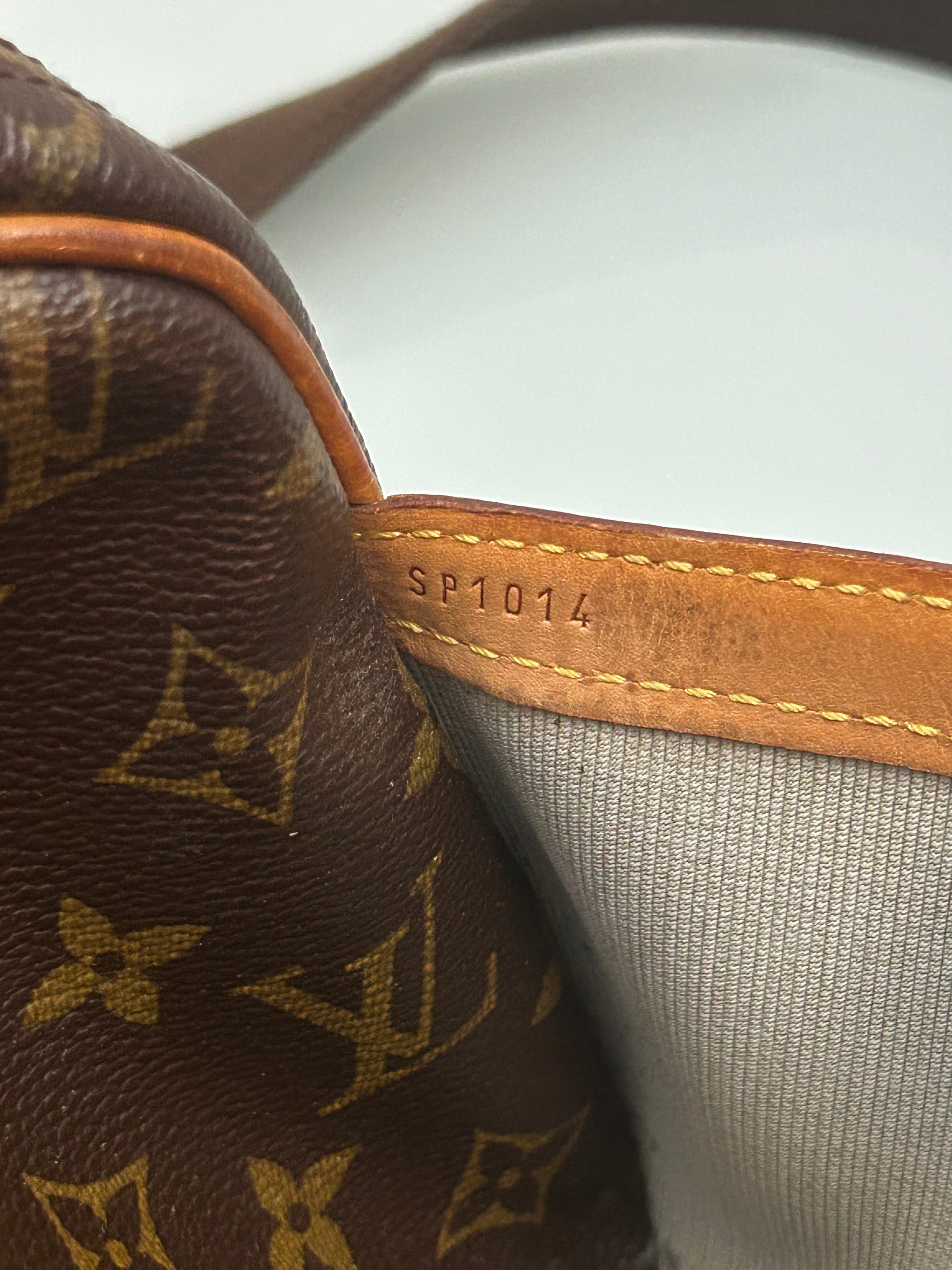 Louis Vuitton Reporter
