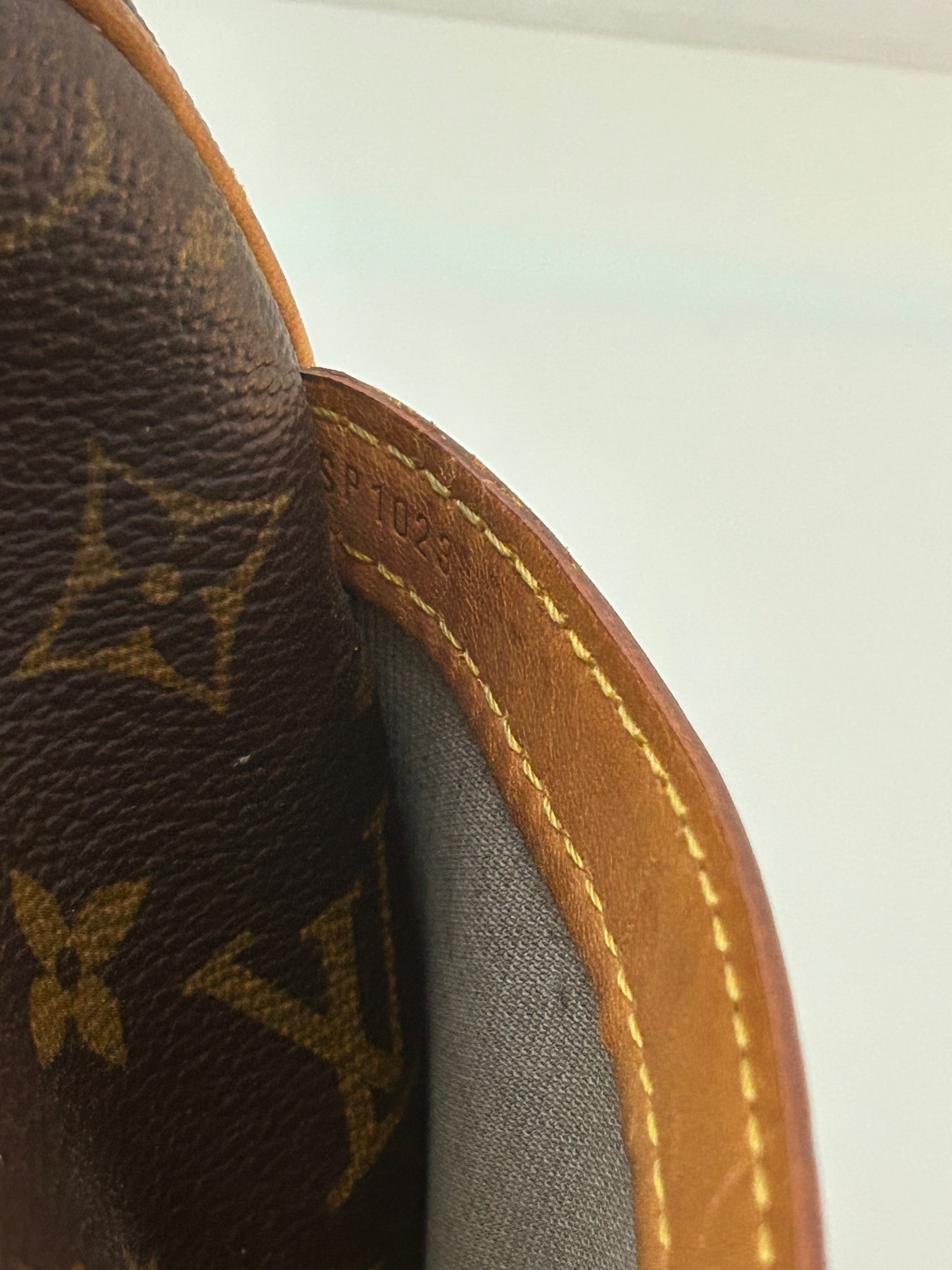 Louis Vuitton Reporter
