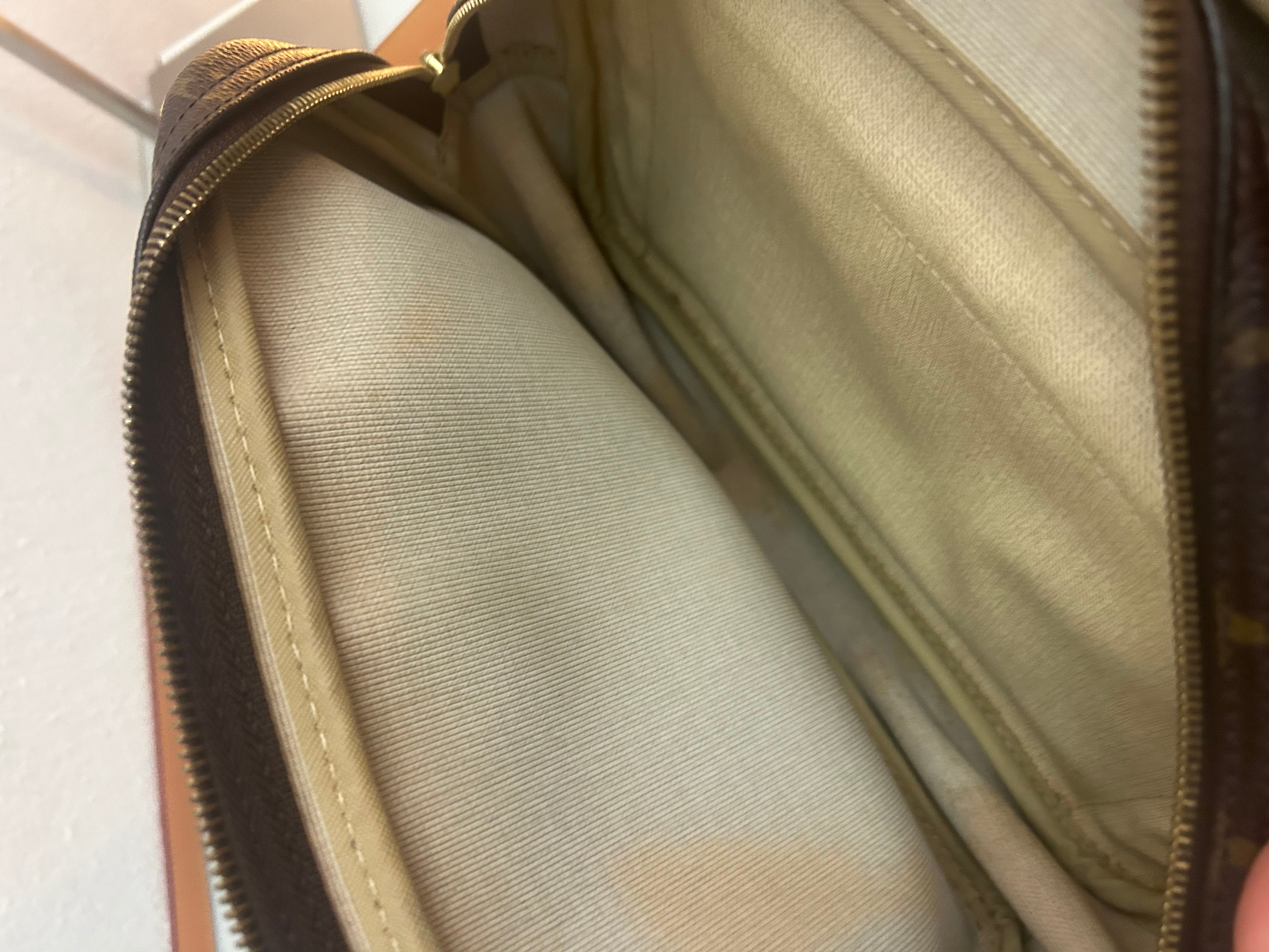 Louis Vuitton Reporter