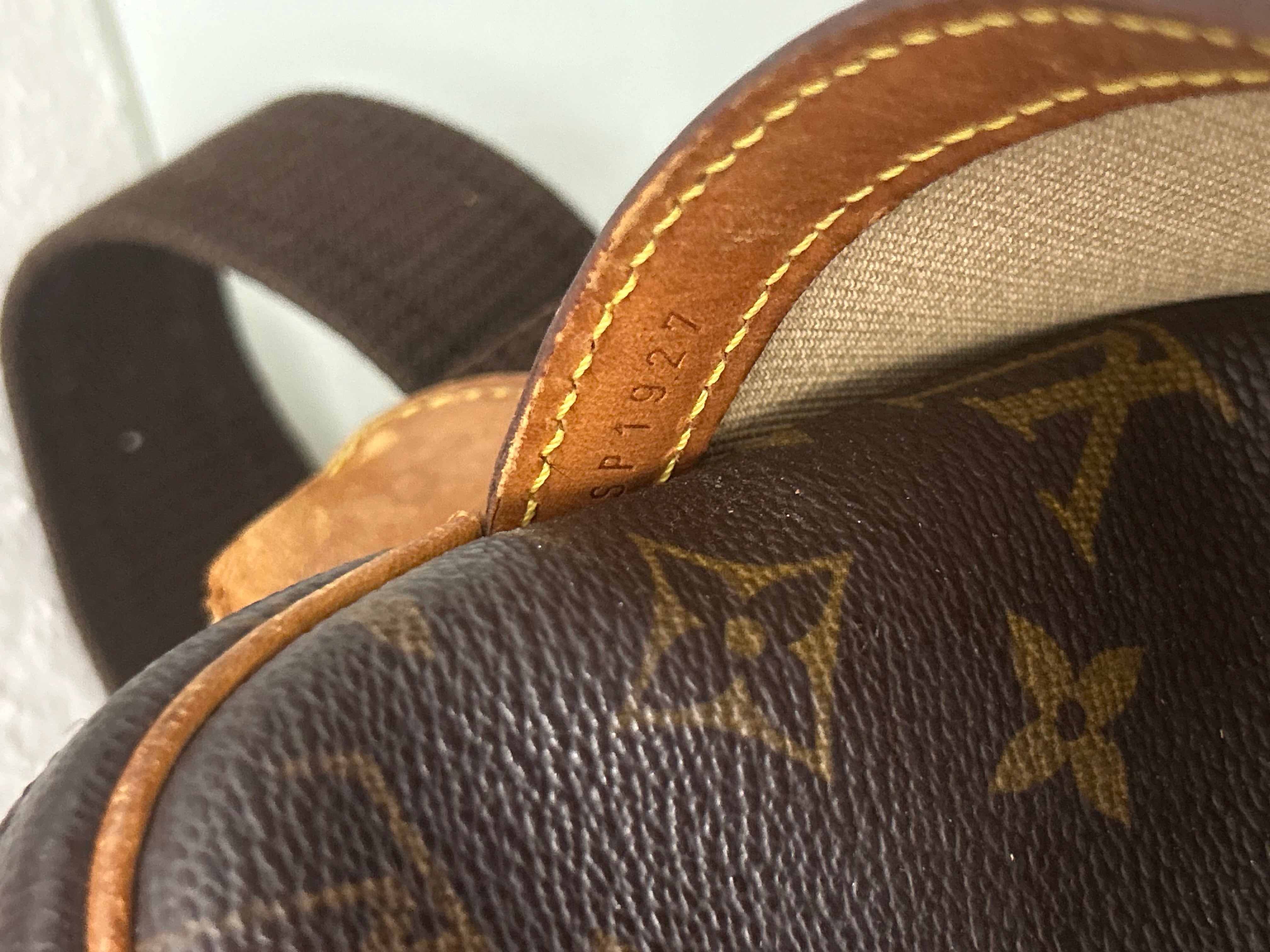Louis Vuitton Reporter