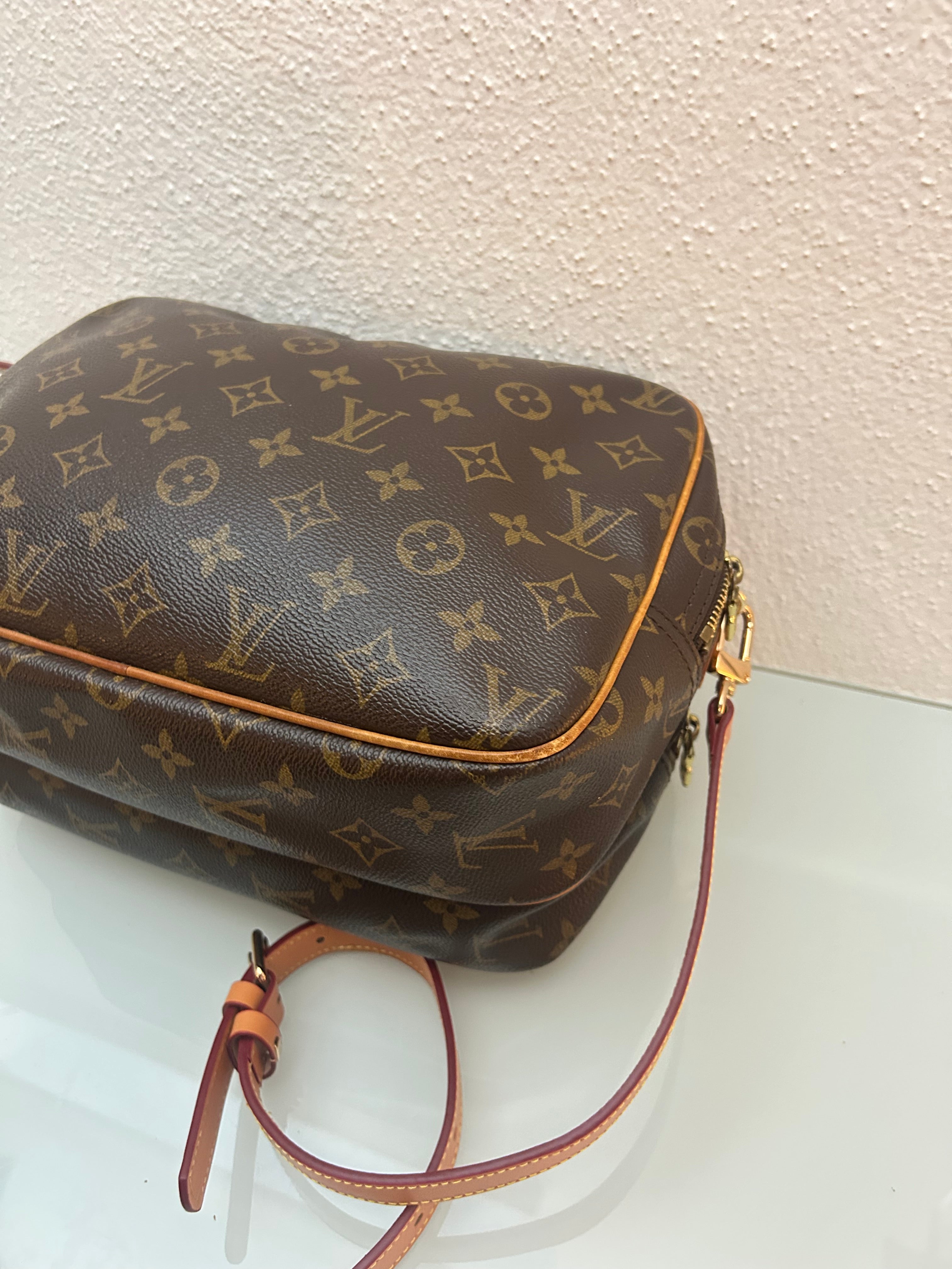 Louis Vuitton Reporter