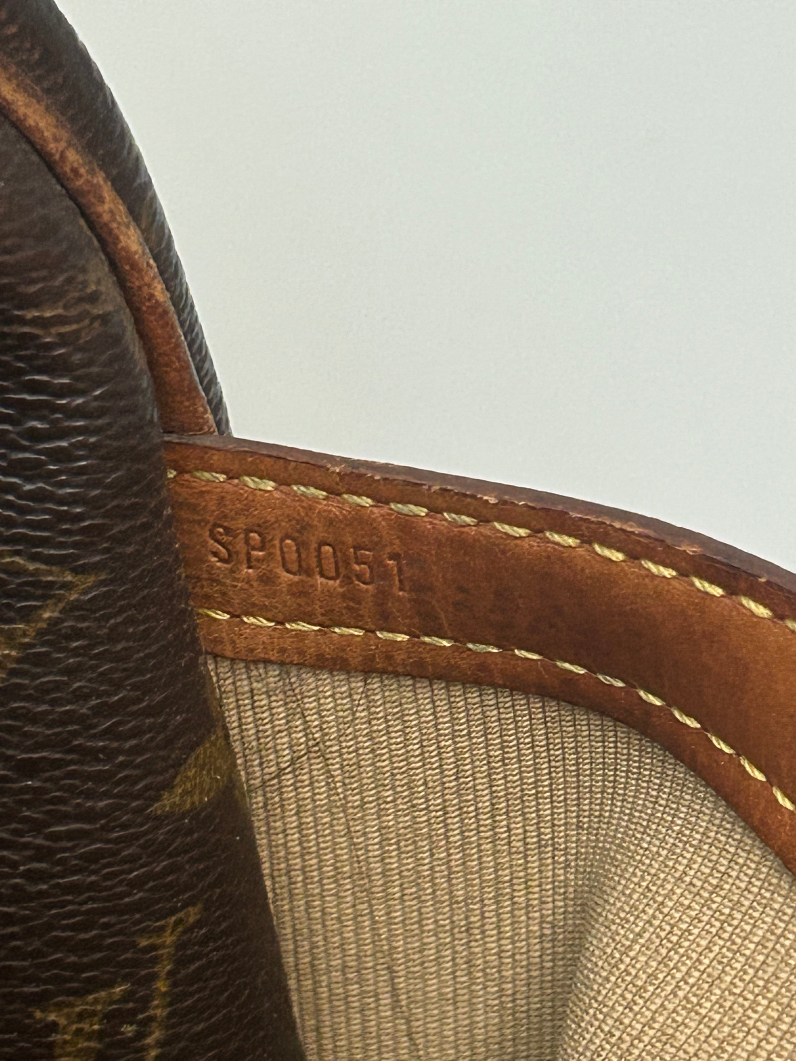 Louis Vuitton Reporter