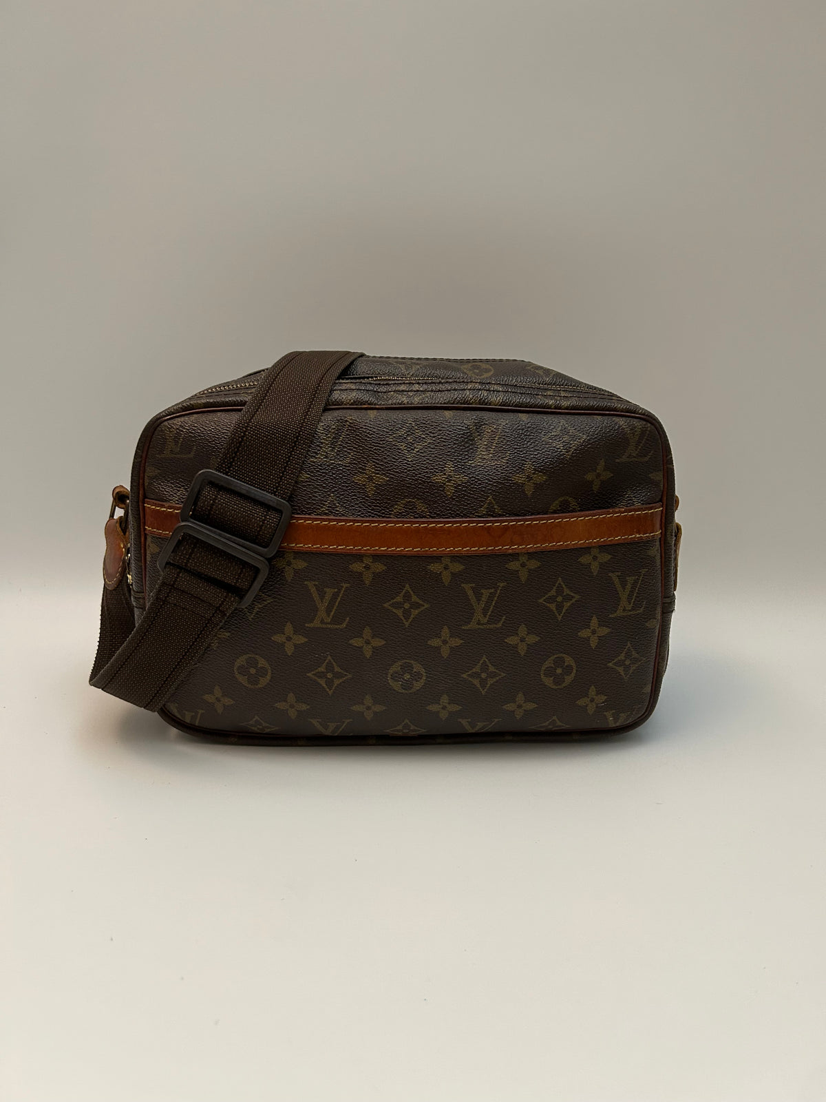 Louis Vuitton Reporter