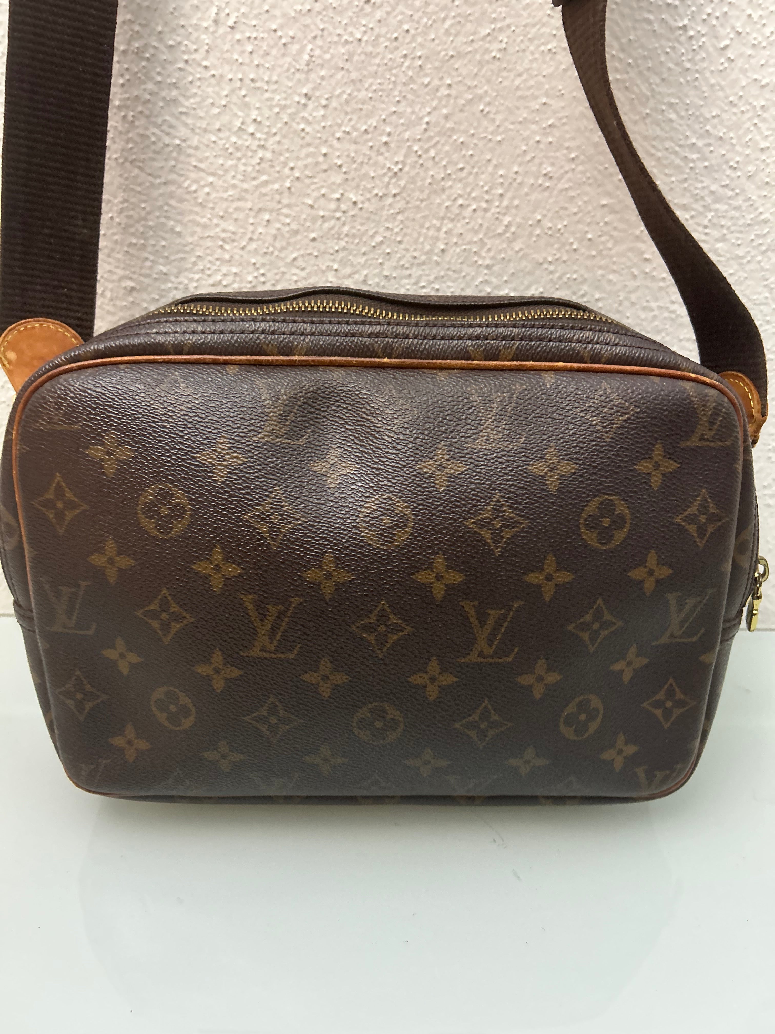 Louis Vuitton Reporter